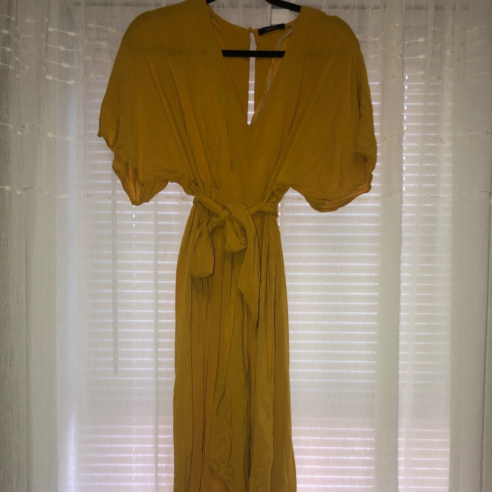 Mustard waist tie jumpsuit.